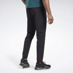 PERFORMANCE WOVEN PANTS - SVARTAR