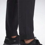 PERFORMANCE WOVEN PANTS - SVARTAR